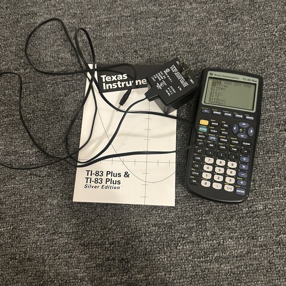 Texas Instruments Graphing Calculator TI-83 Plus w/ Manual